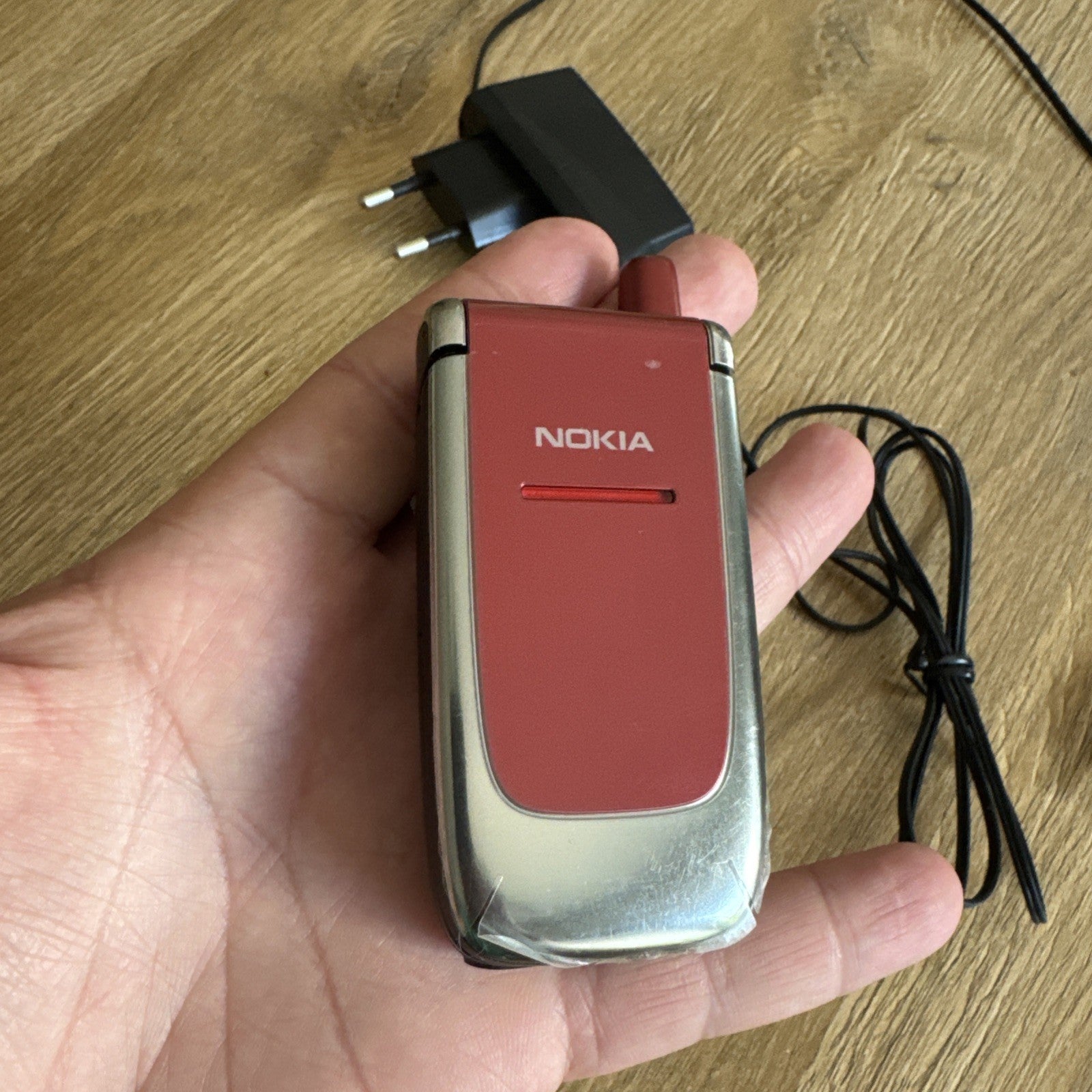 6980956
