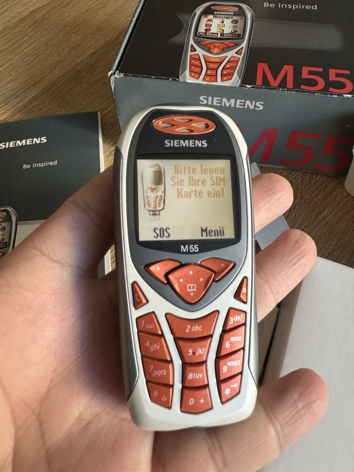 6998748