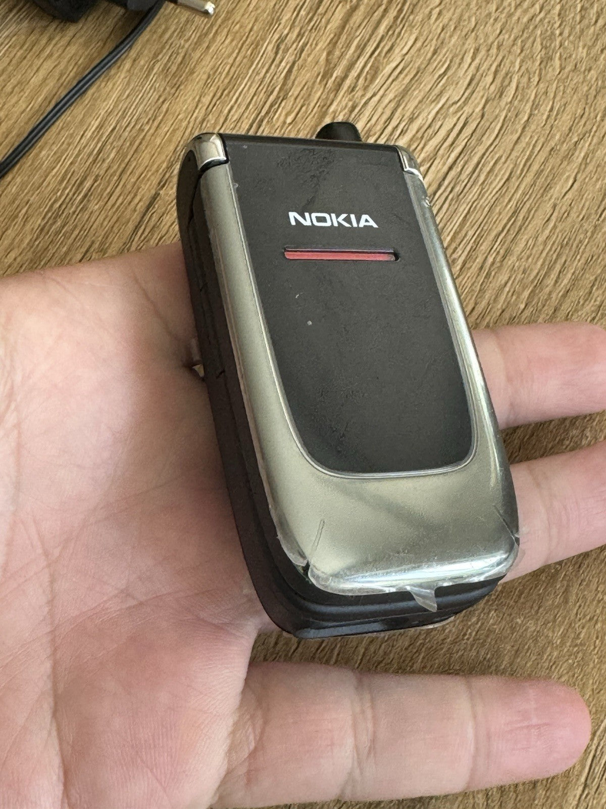6980894