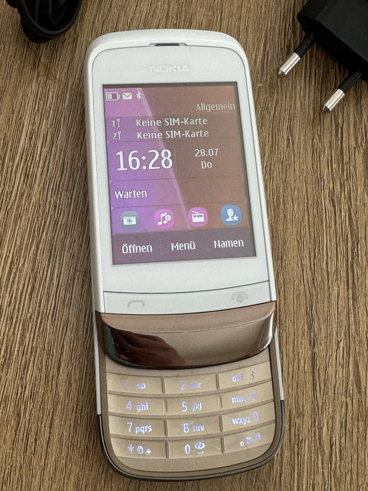6980853