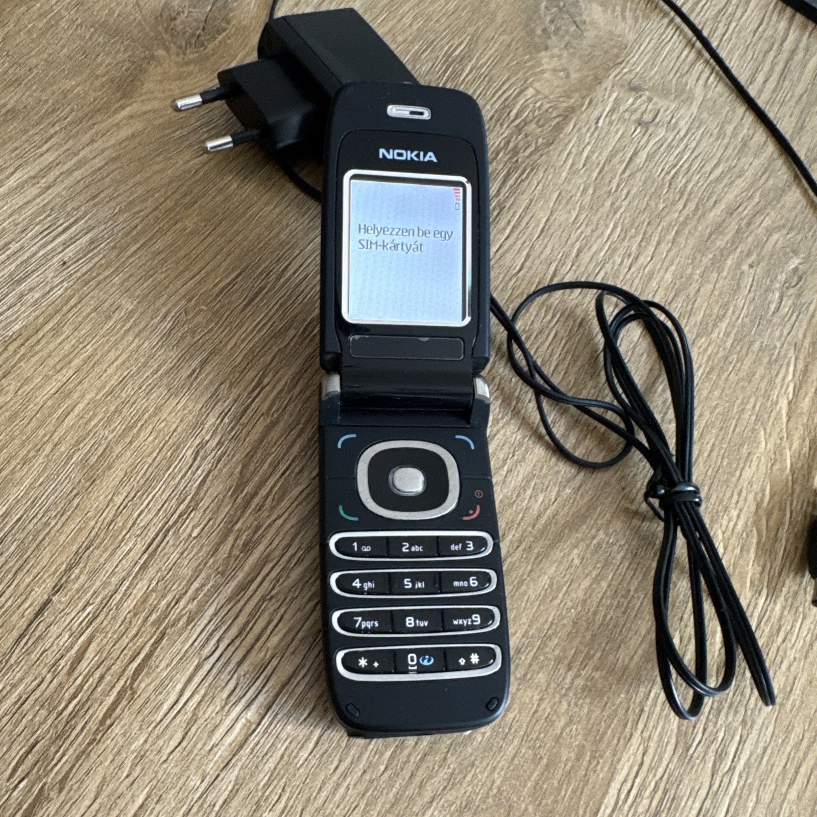 6980956