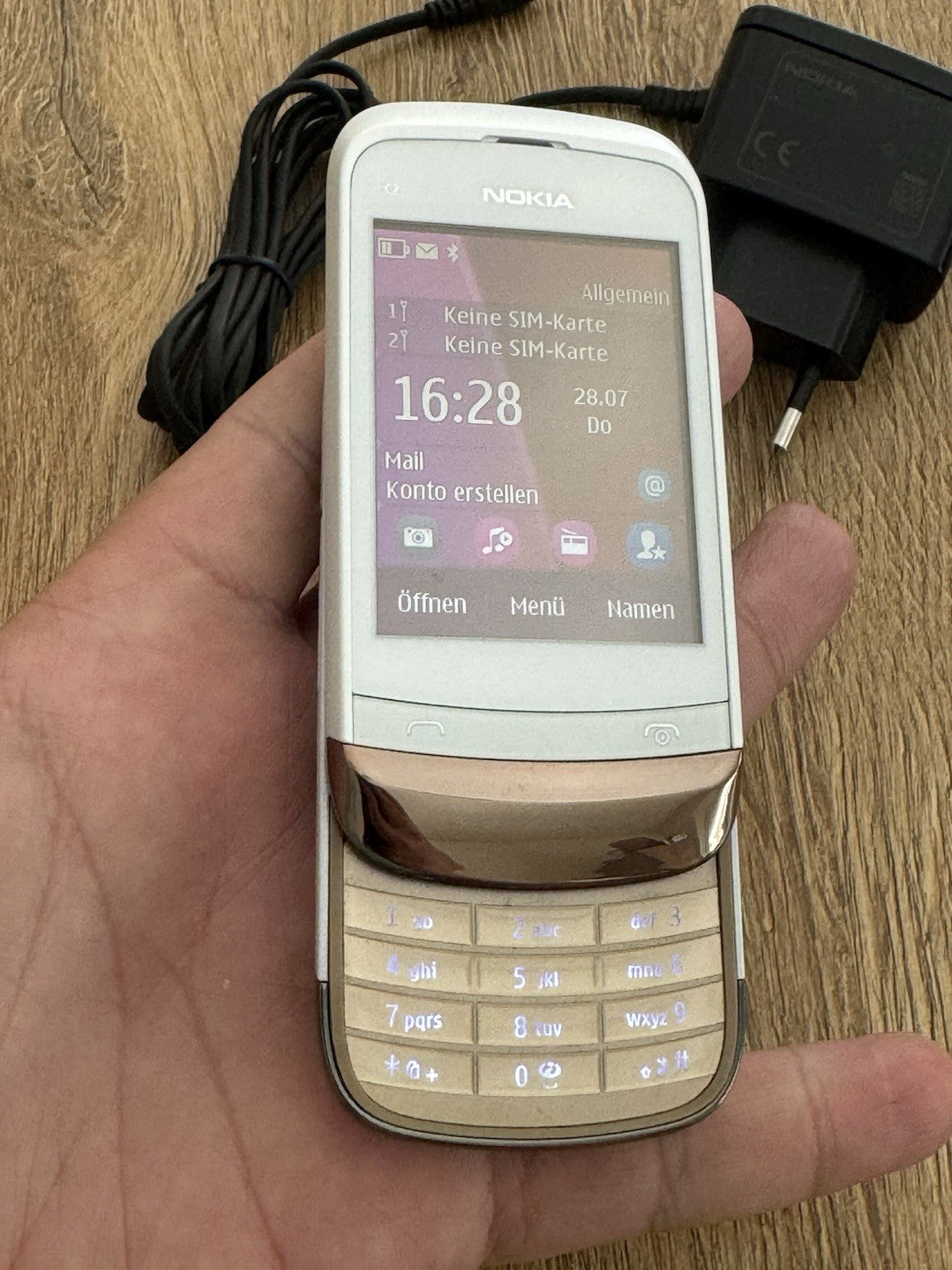 6980853