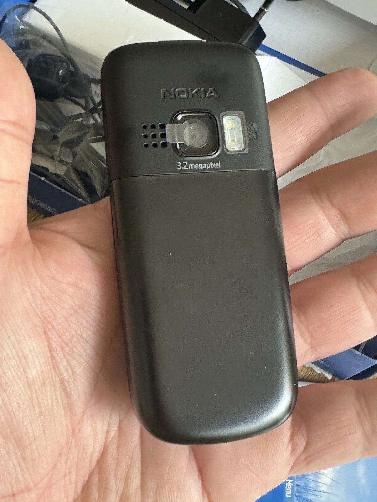 7077932