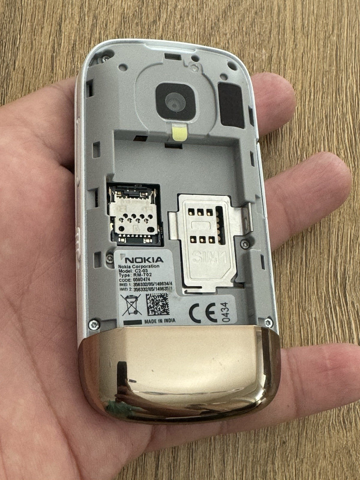 6980853