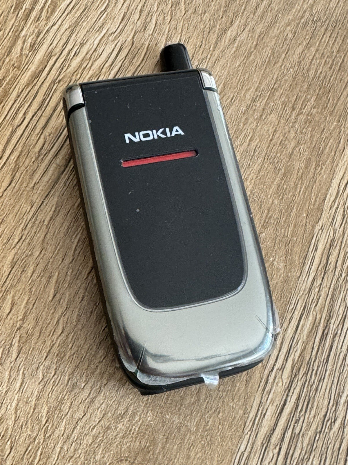 6980894
