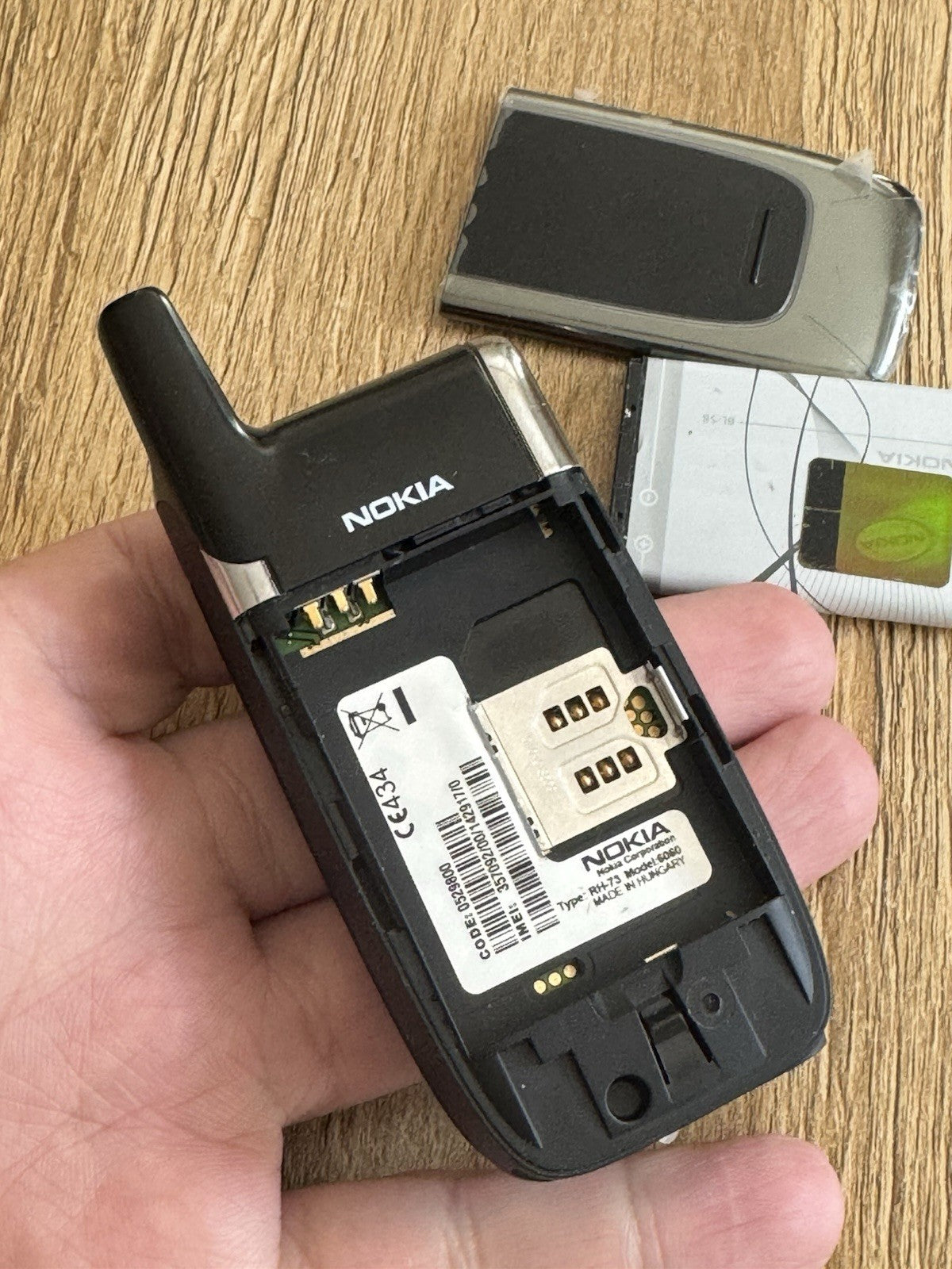 6980894