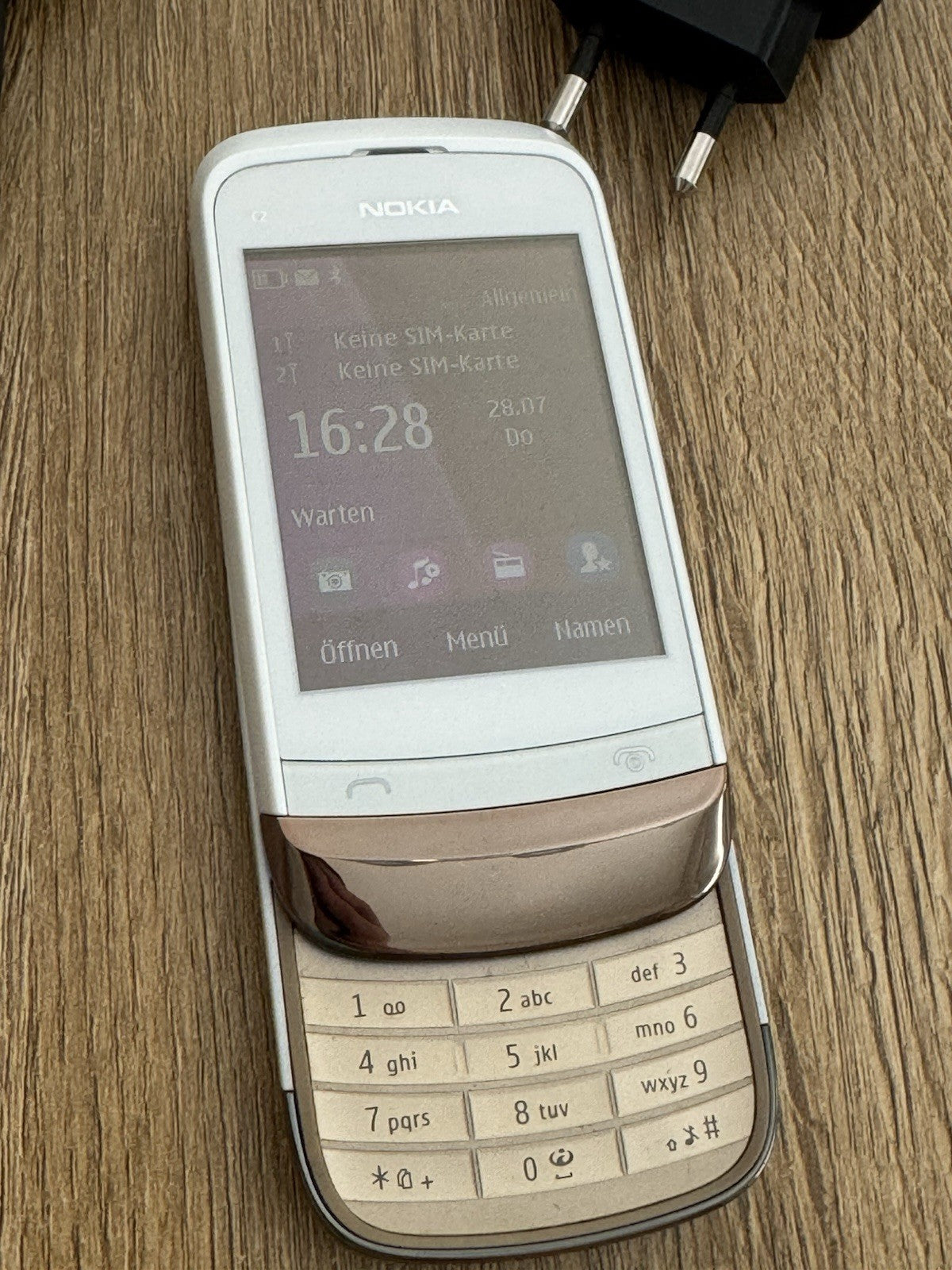 6980853