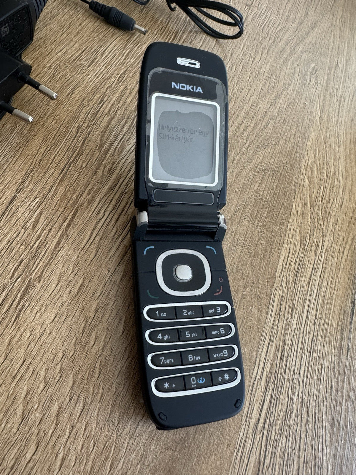 6980894