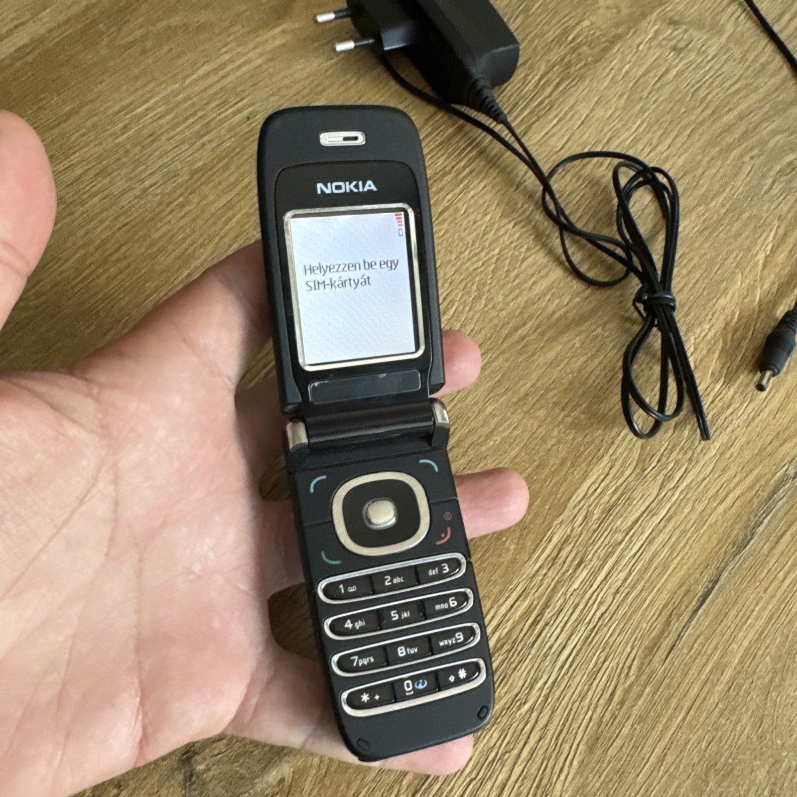 6980956